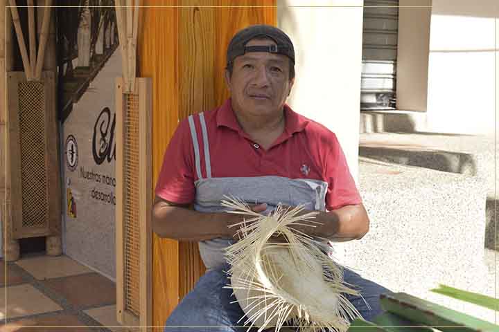 craftsman hammering fine hats